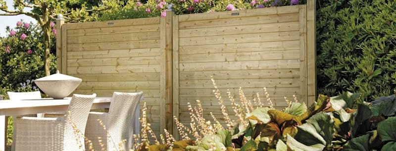 weereenschutting23 Hoever moet een paal de grond in? Schutting tuin groen